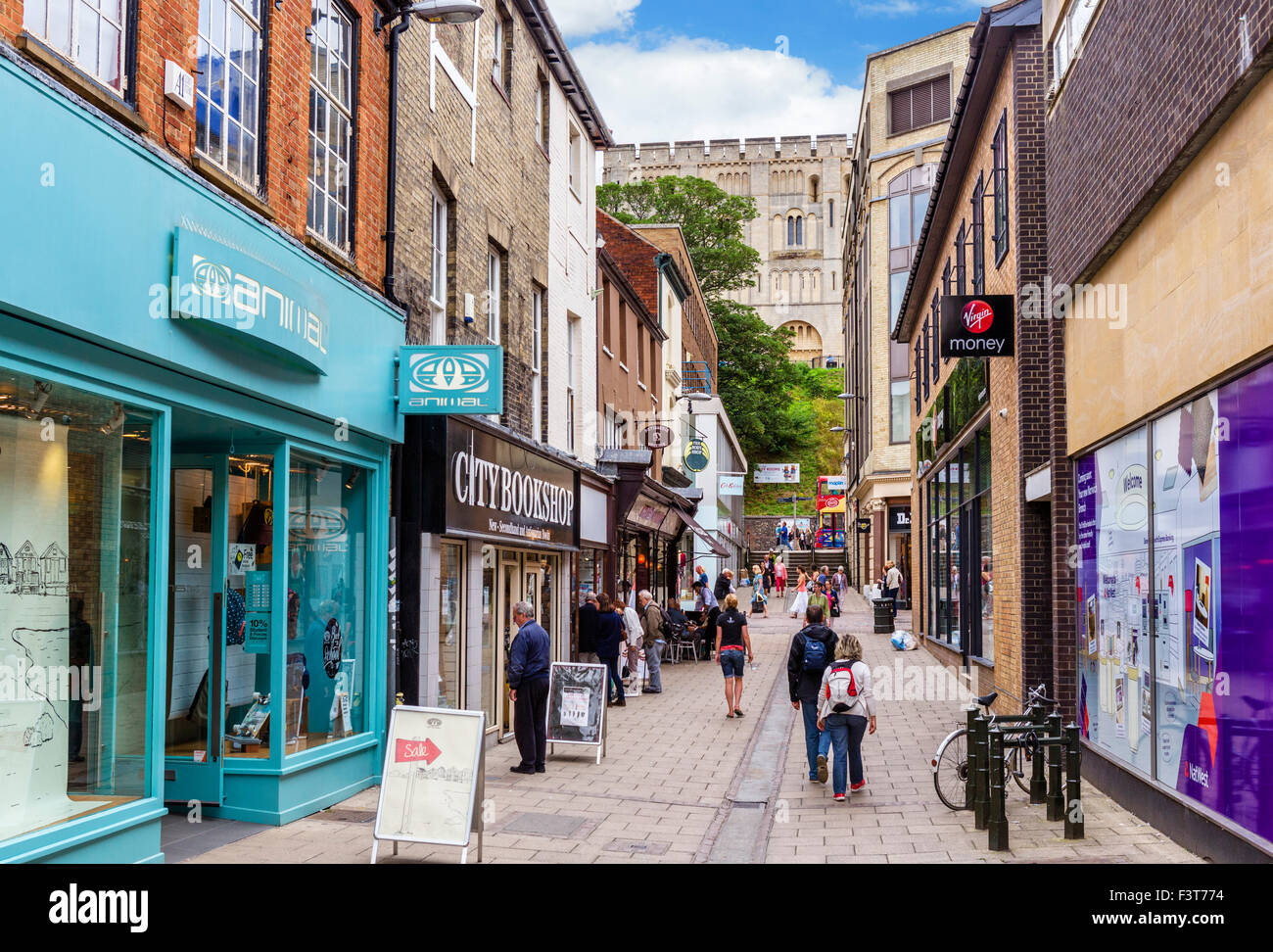 Shops on Davey Place in the city centre looking towards the castle, Norwich, Norfolk, England, UK Stock Photo