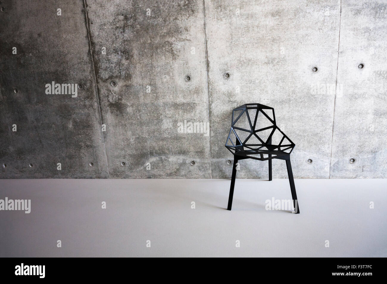 Modern contemporary black chair at the Towner Art Gallery, Eastbourne, East Sussex, England, UK Stock Photo