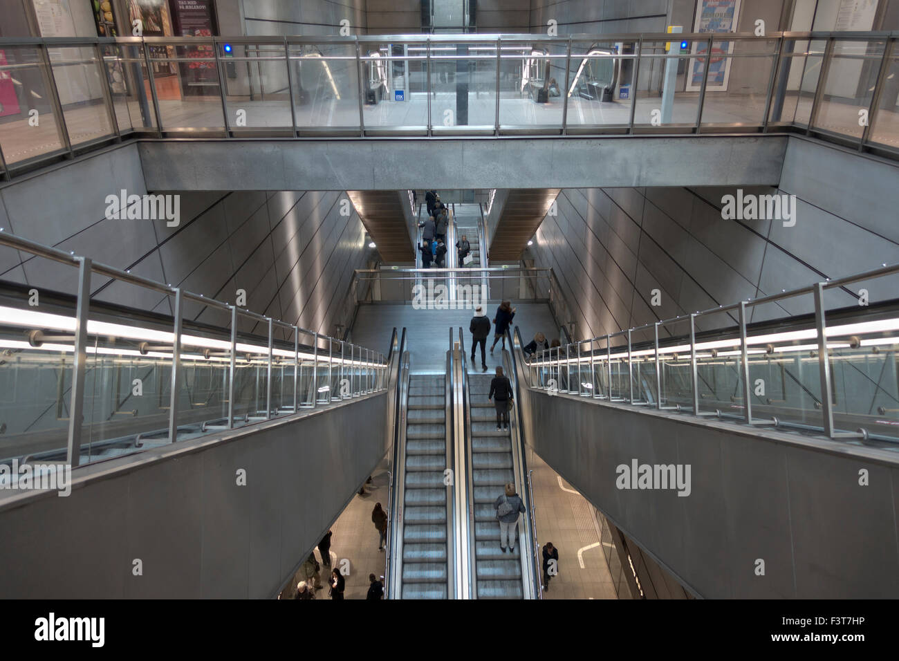 Escalators to and from the platforms at the underground Metro station at Nørreport, Copenhagen. Stock Photo
