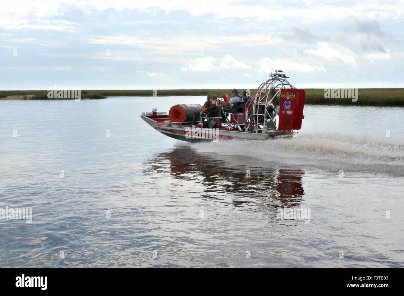 Charleston County Rescue Squad patrols the Intracoastal Waterway by airboat following massive floods October 10, 2015 in McClellanville, South Carolina. Large parts of South Carolina suffered from record setting rains that flooded large portions of the state. Stock Photo