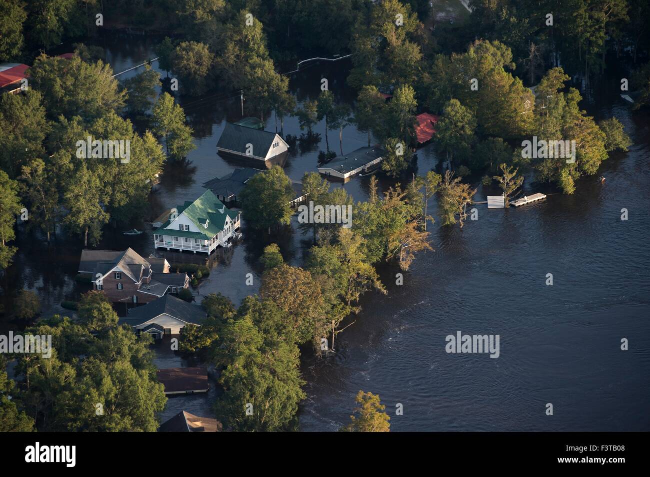 Aerial view of homes submerged in floodwaters after record breaking storms dumped more than two feet of rain October 9, 2015 in Andrews, South Carolina. At least 17 people have died from the floods that effected most of South Carolina. Stock Photo