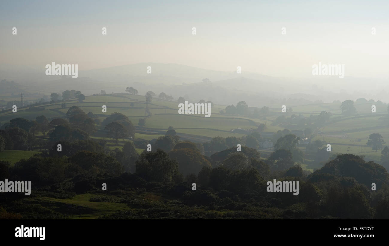 A hazy summer day in Cumbria viewed from The Helm, Kendal, South Lakes, UK Stock Photo