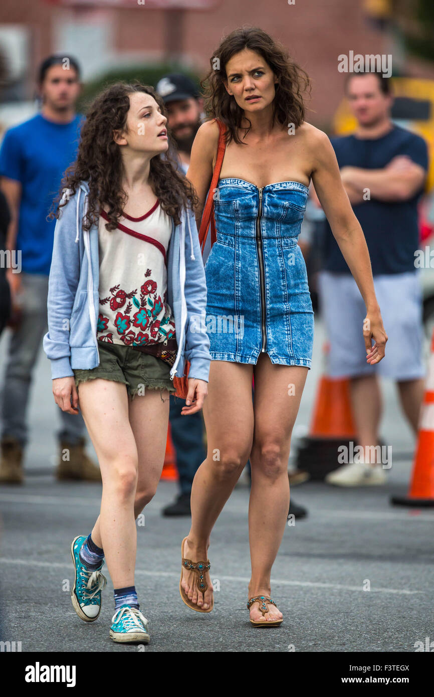 Katie Holmes wearing a zipped front denim dress shopping at