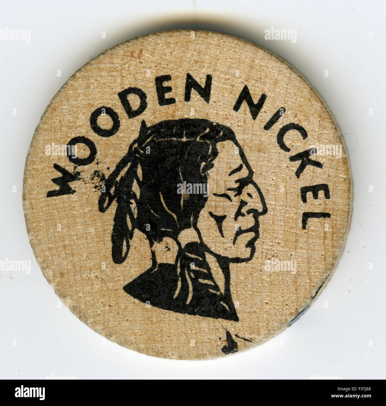 Wooden nickel given to other soldiers by members of Company H 75th