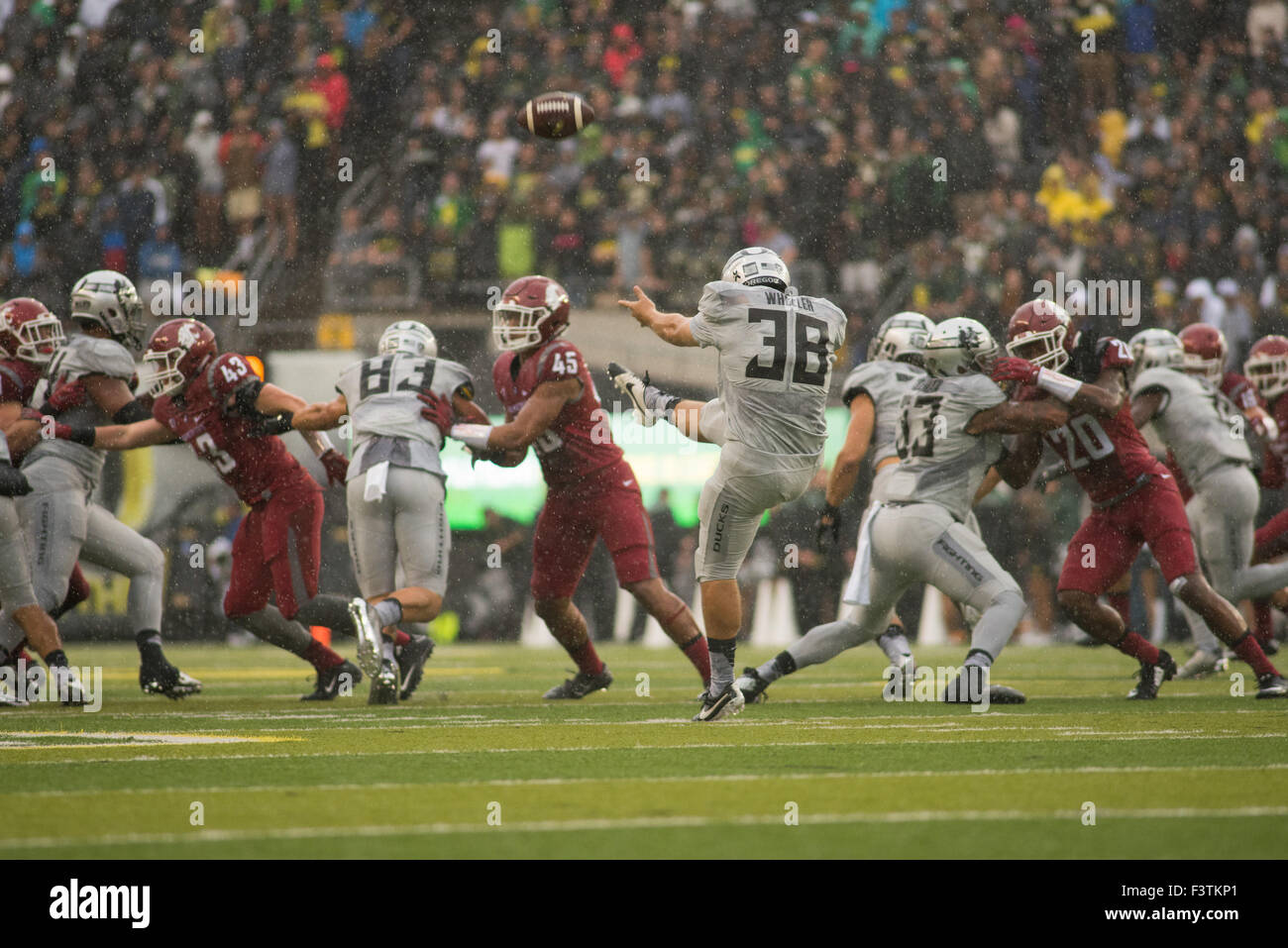 Double Overtime. 10th Oct, 2015. Oregon kicker Ian Wheeler (38) punts ...