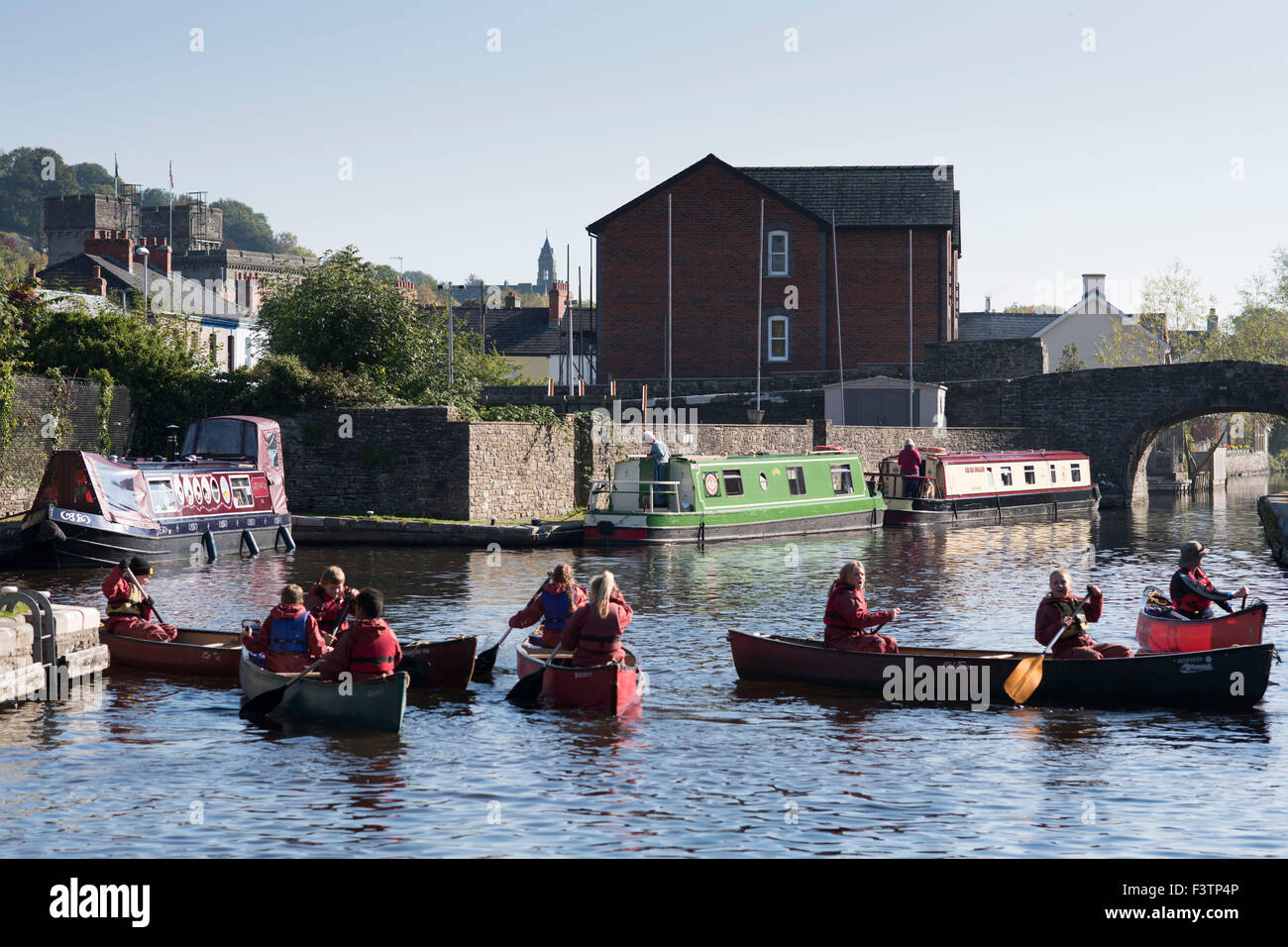 Kayakers in the Monmouthshire and Brecon Canal in Brecon, South Wales. Stock Photo