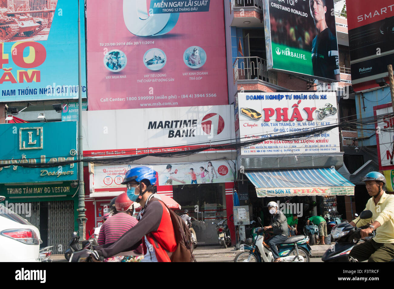 scooter motorcycle riders in Ho Chi Minh Saigon city centre,South