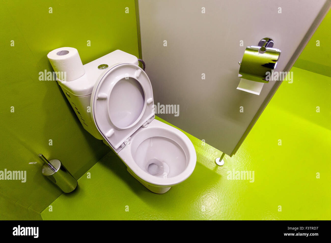 Toilet seat in green Stock Photo