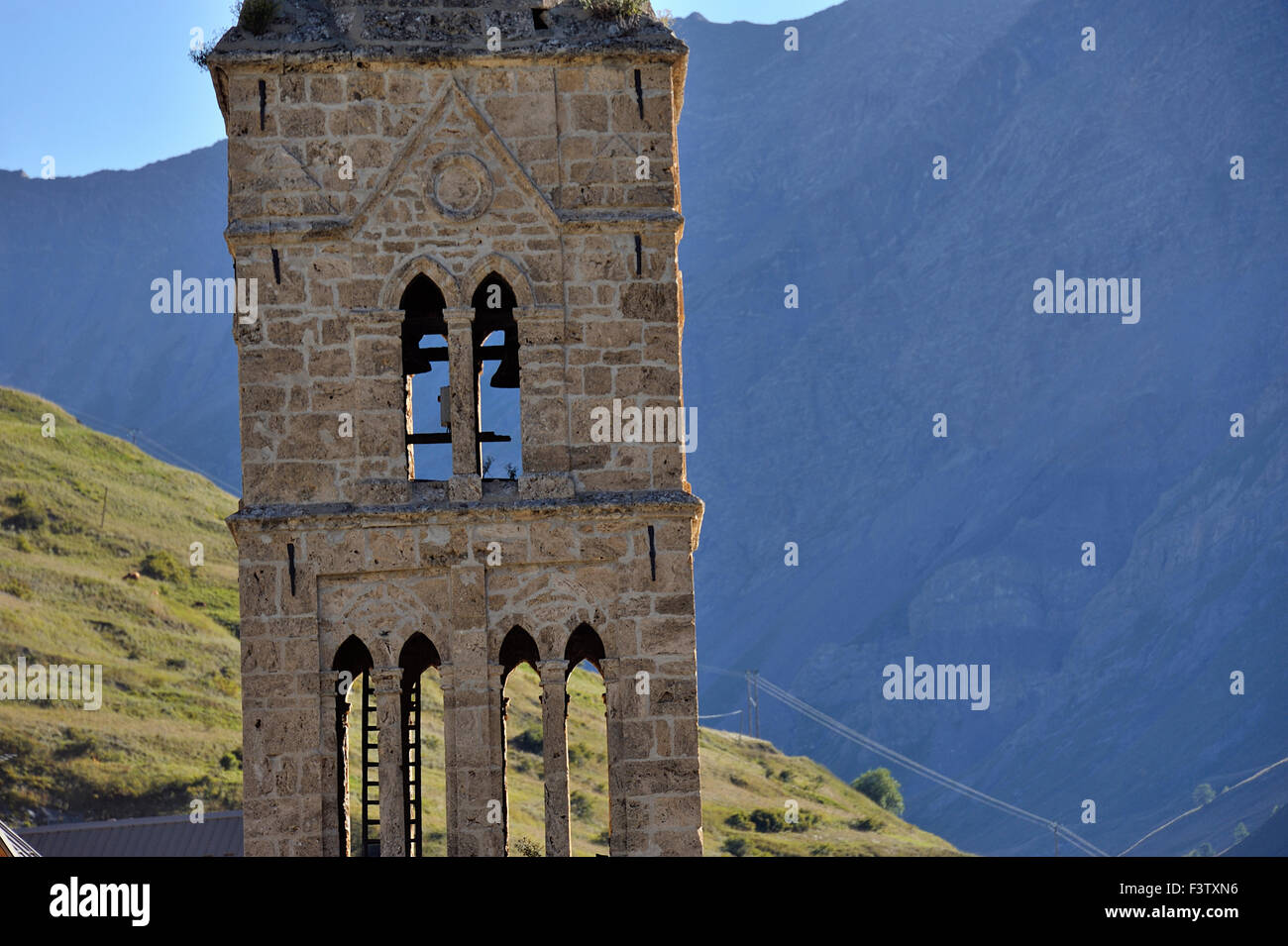 Romanesque Steeple of the mountain village Le Chazelet,  village Les Terraces in the background, French Alps, France Stock Photo