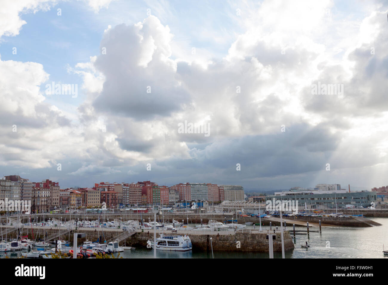 a horizontal view of the port of Gijón, Asturias with a magnificent and spectacular cloudy sky Stock Photo