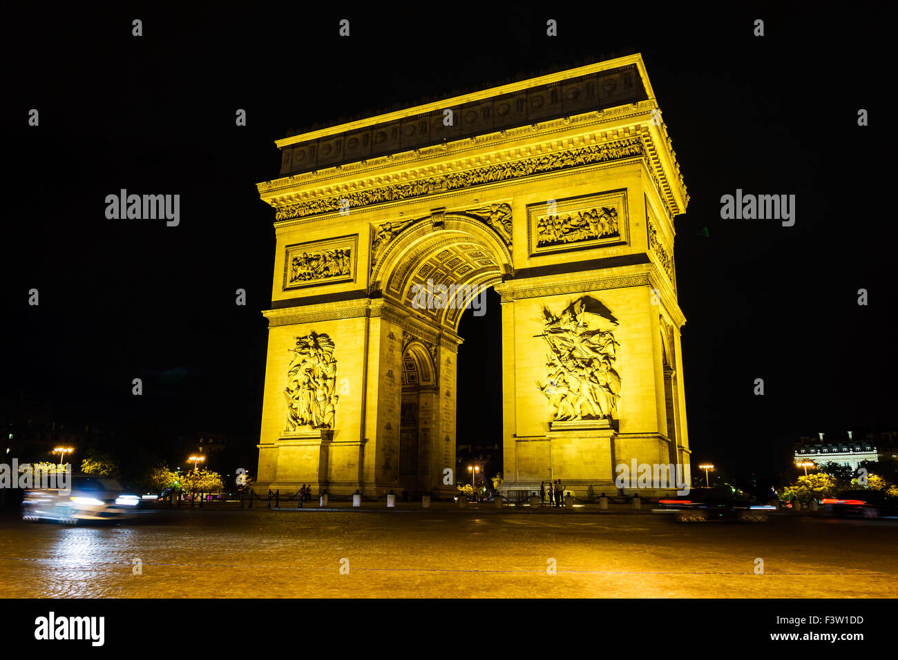 A black summer night blankets the Arc de Triomphe. Paris, France. Stock Photo