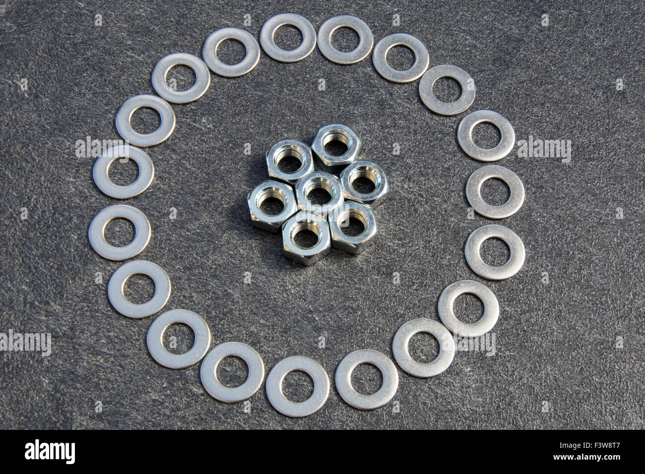 A decorative ring of washers and nuts Stock Photo Alamy