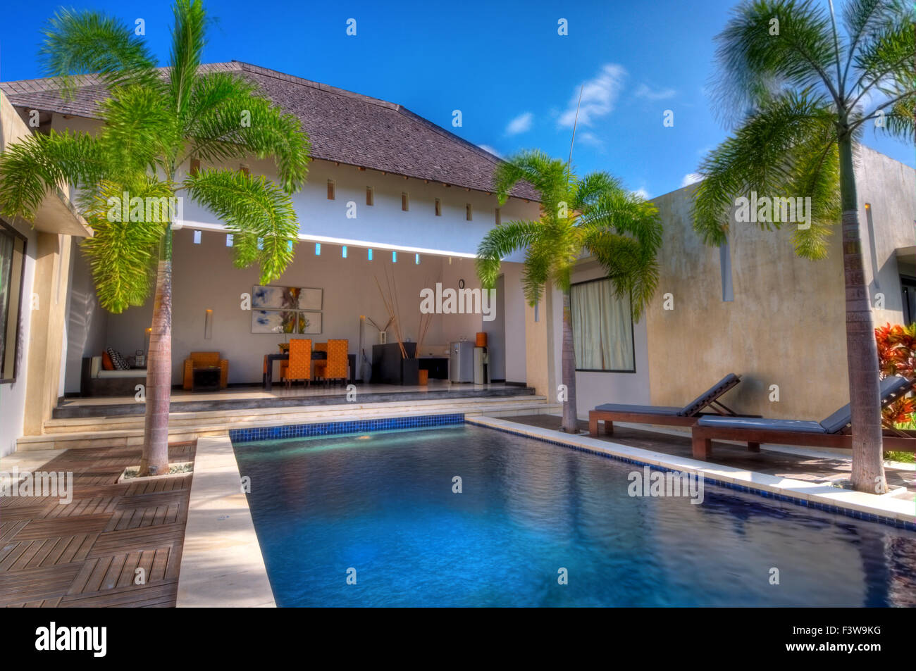 Villa with swimming pool and relaxation bed Stock Photo