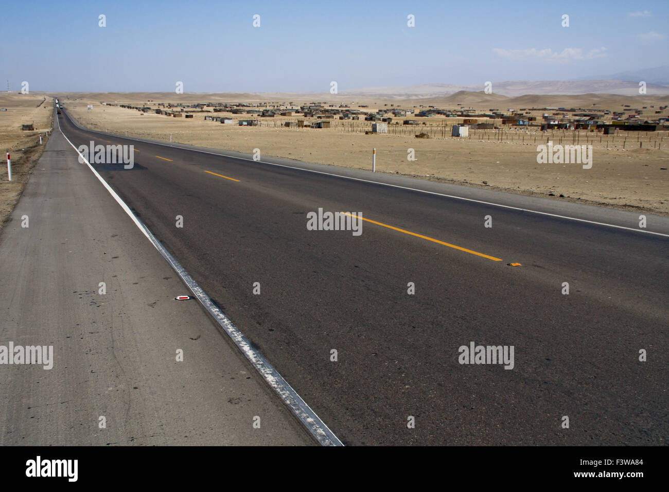 Road in desert, Peru Panamericana Stock Photo
