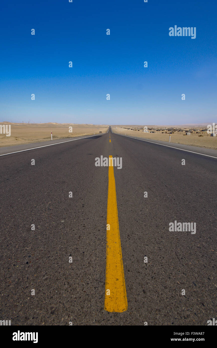 Road in desert, Peru Panamericana Stock Photo