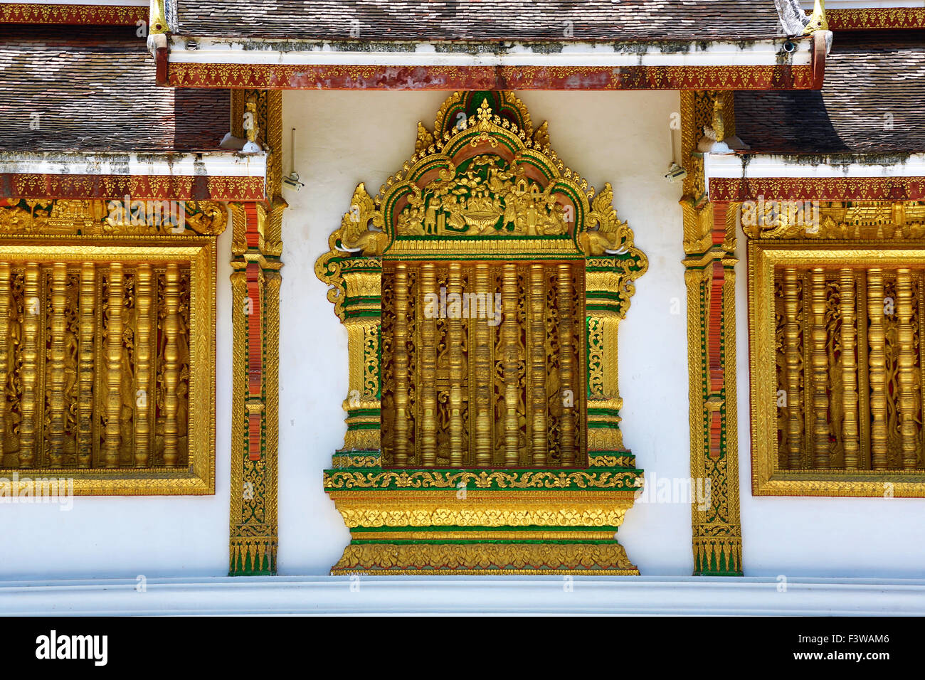 Window decorations at Wat Ho Prabang Temple, Luang Prabang, Laos Stock Photo