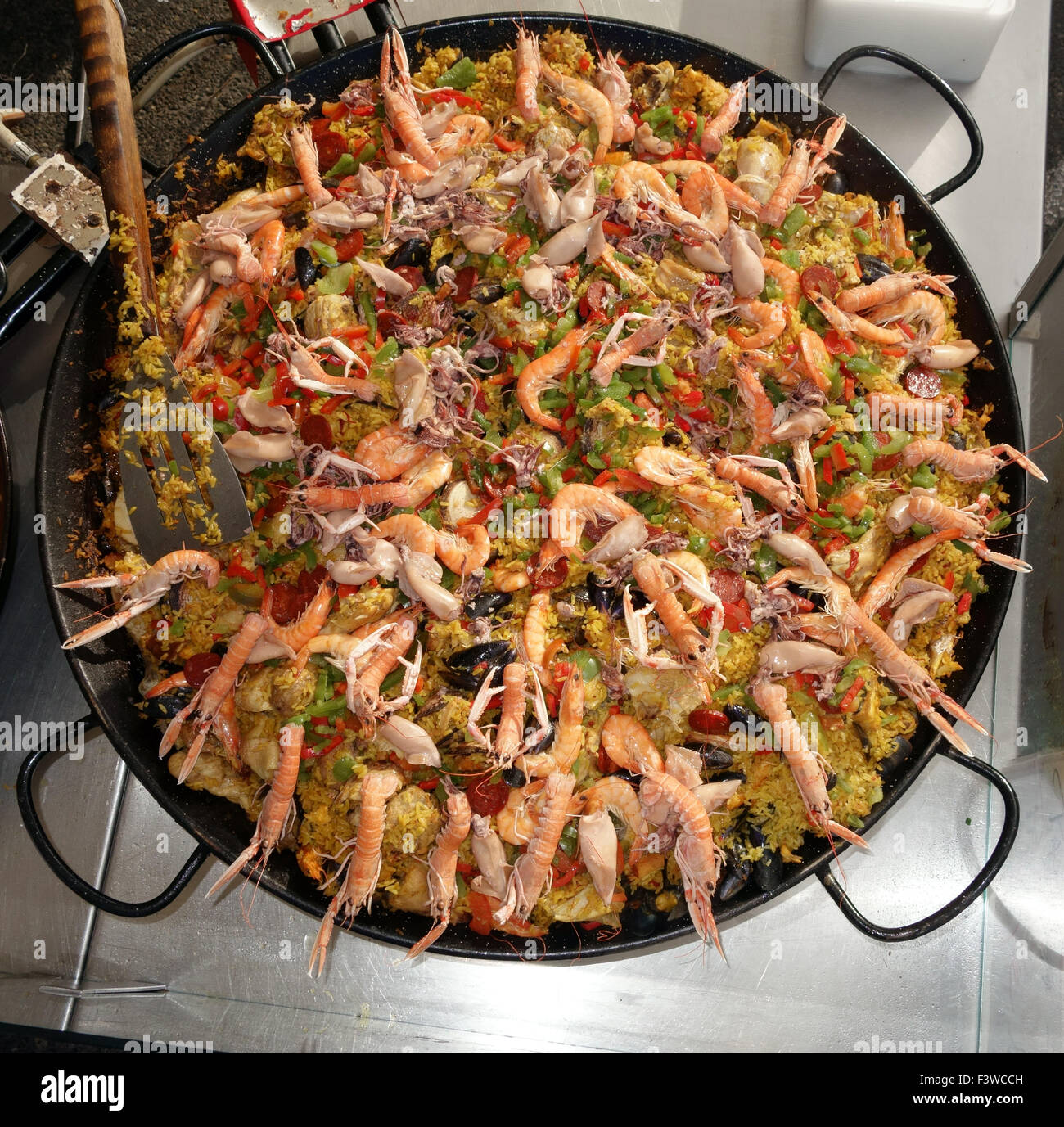 A paellera full of paella Stock Photo