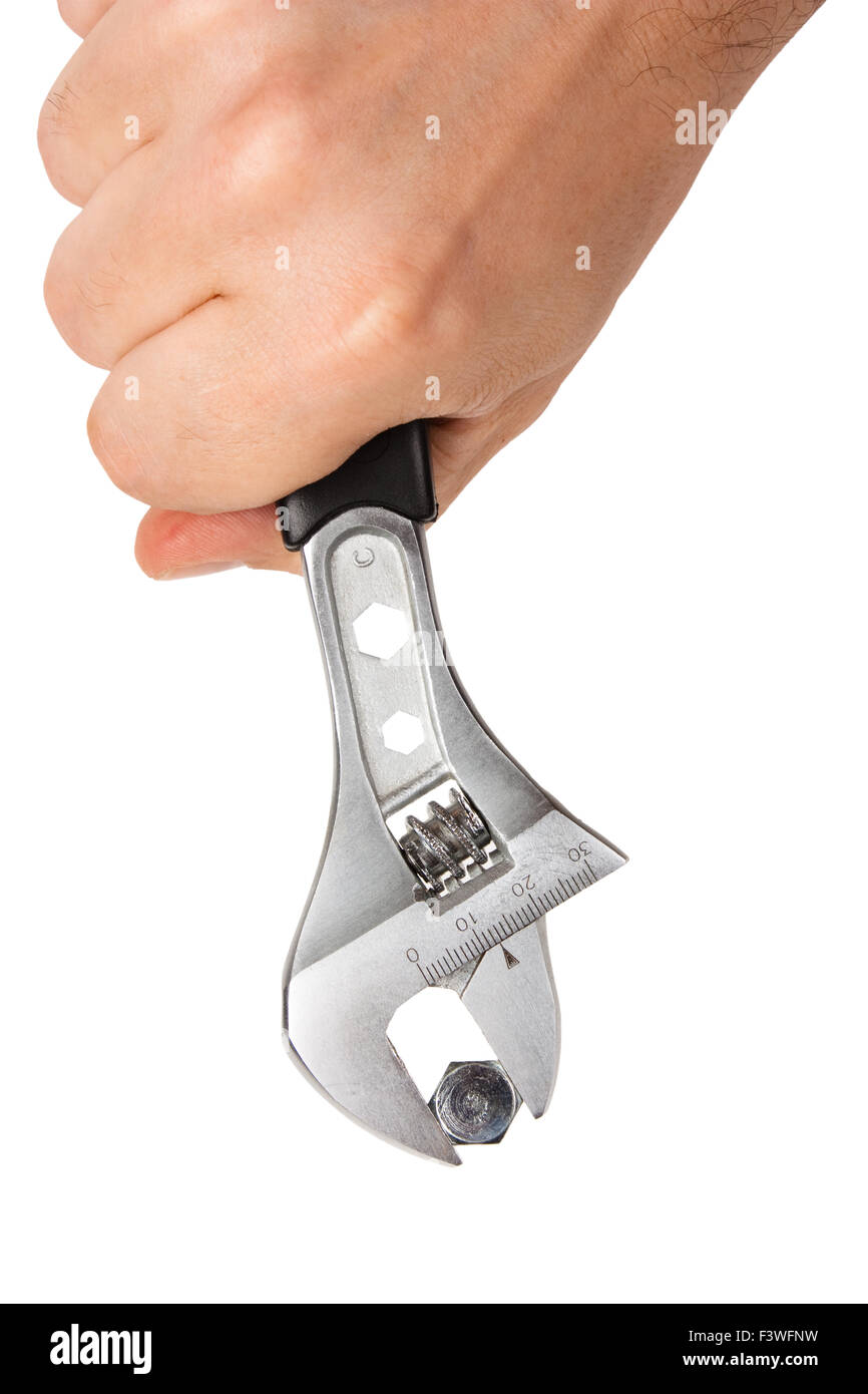wrench with the screw in his hand Stock Photo