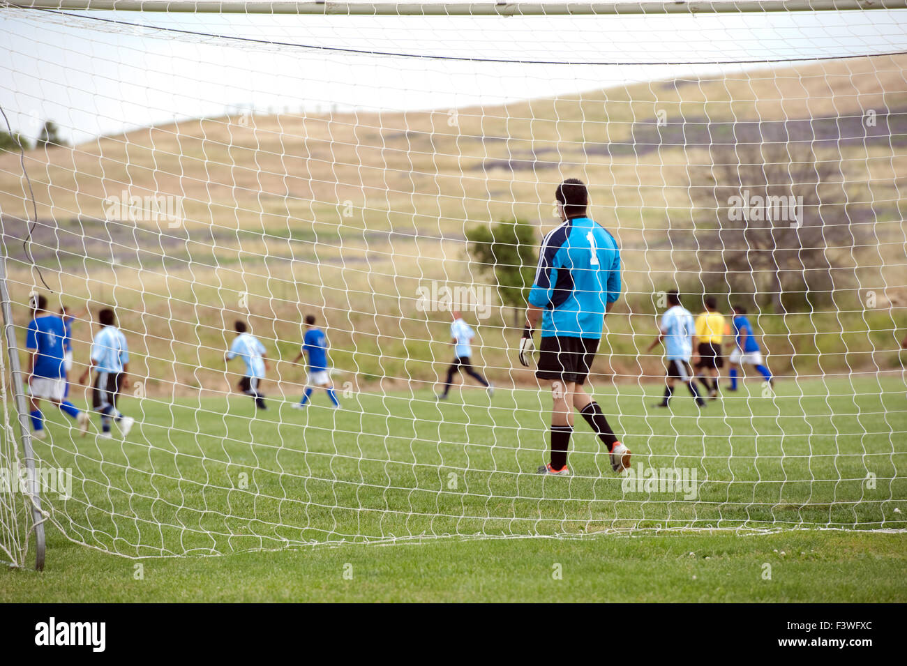 goalie waiting at goal post Stock Photo Alamy
