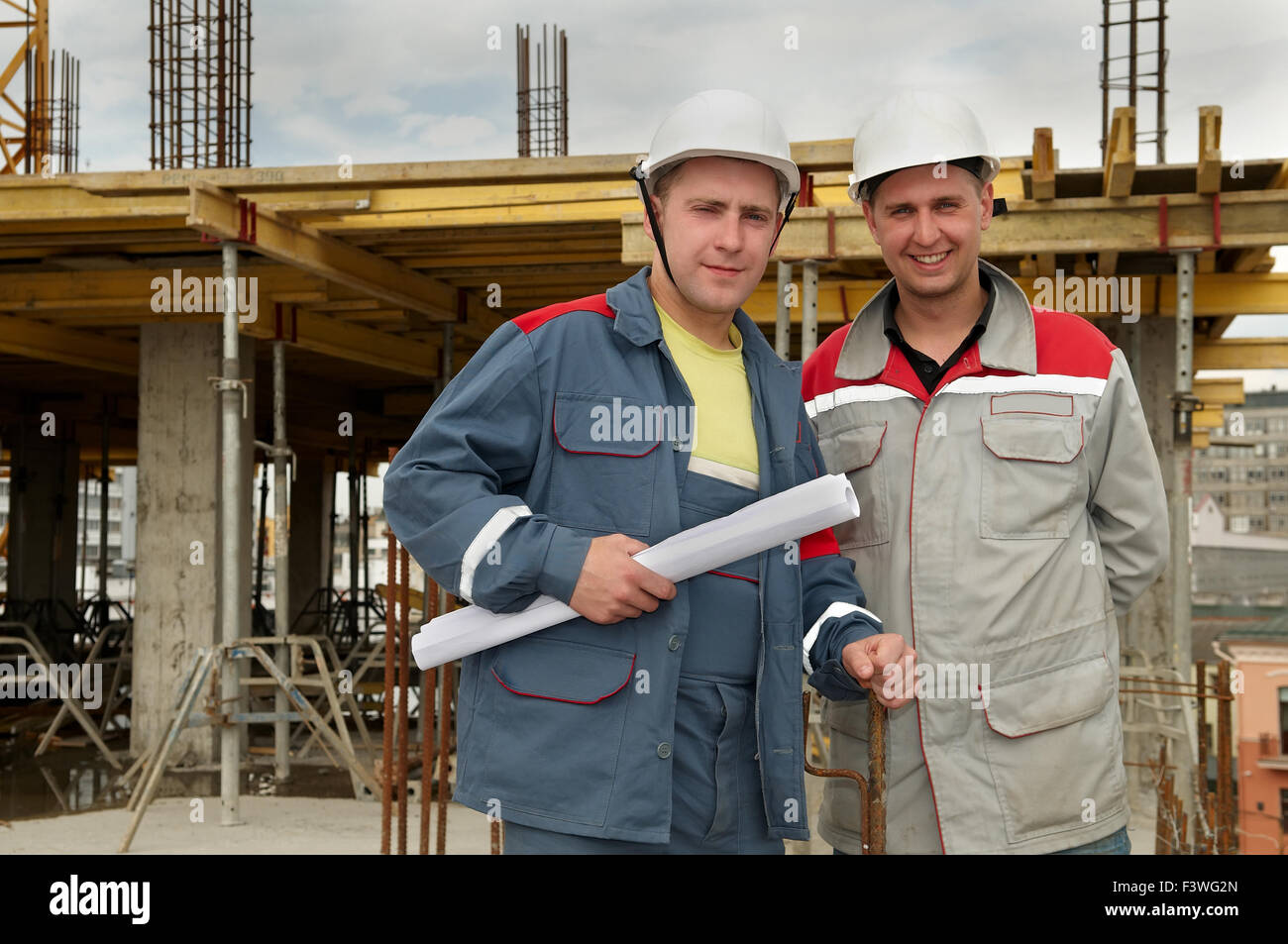 Engineers builders at construction site Stock Photo Alamy