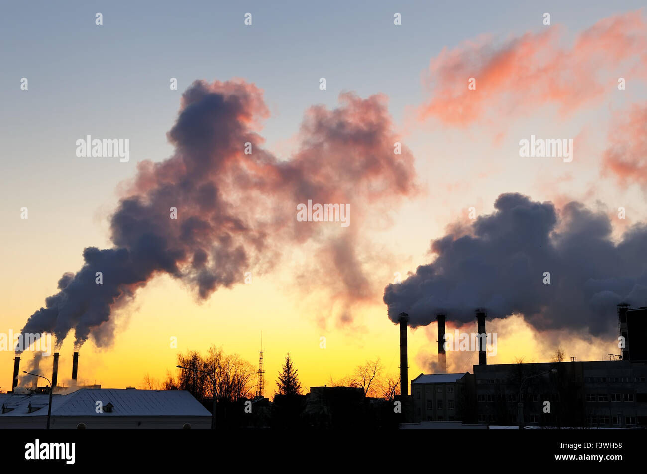 Air pollution by smoke at sunset Stock Photo