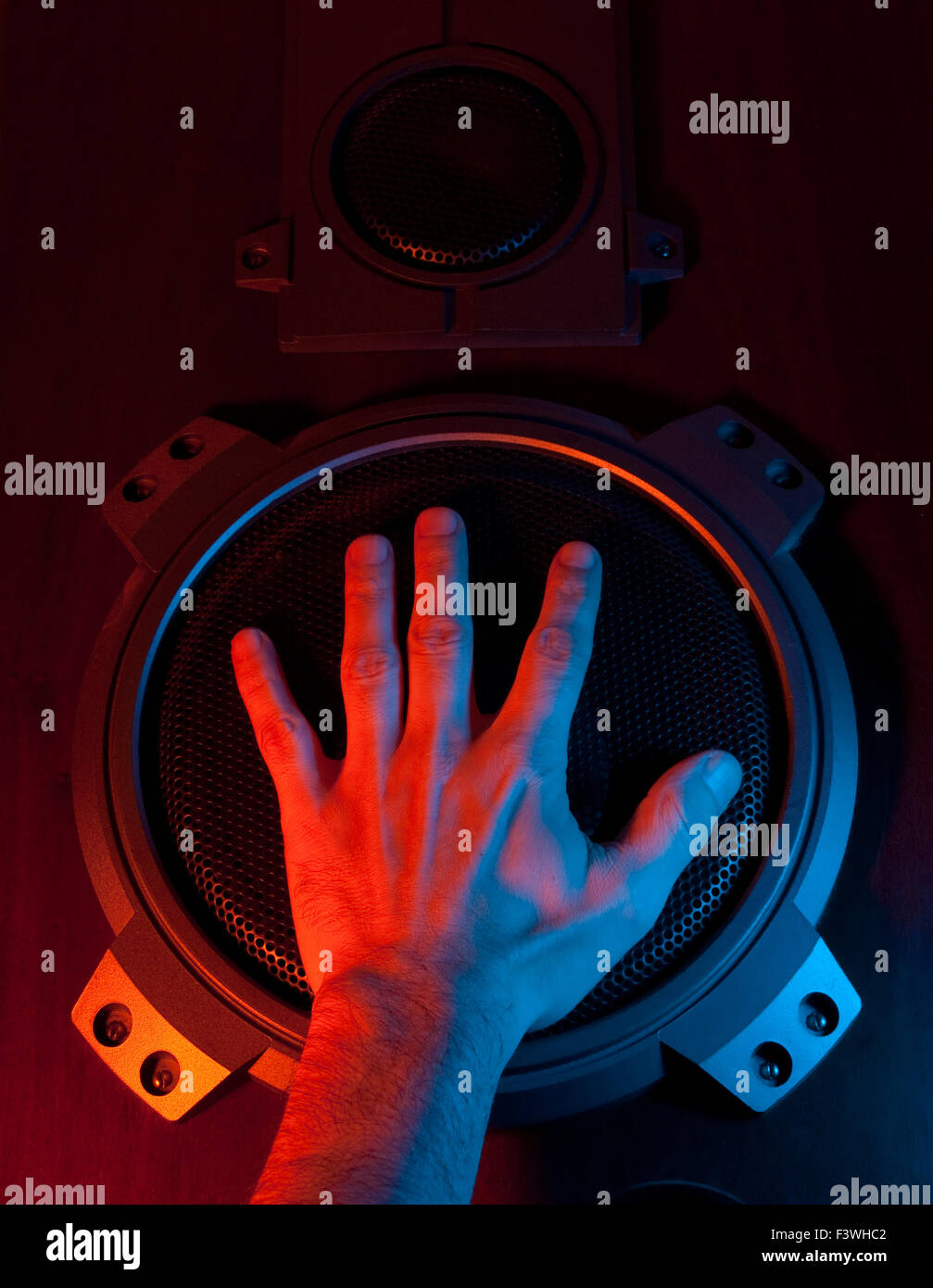 hand covers the speaker Stock Photo - Alamy