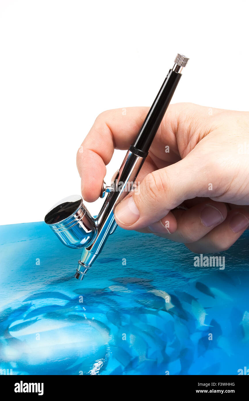 Airbrush in hand Stock Photo