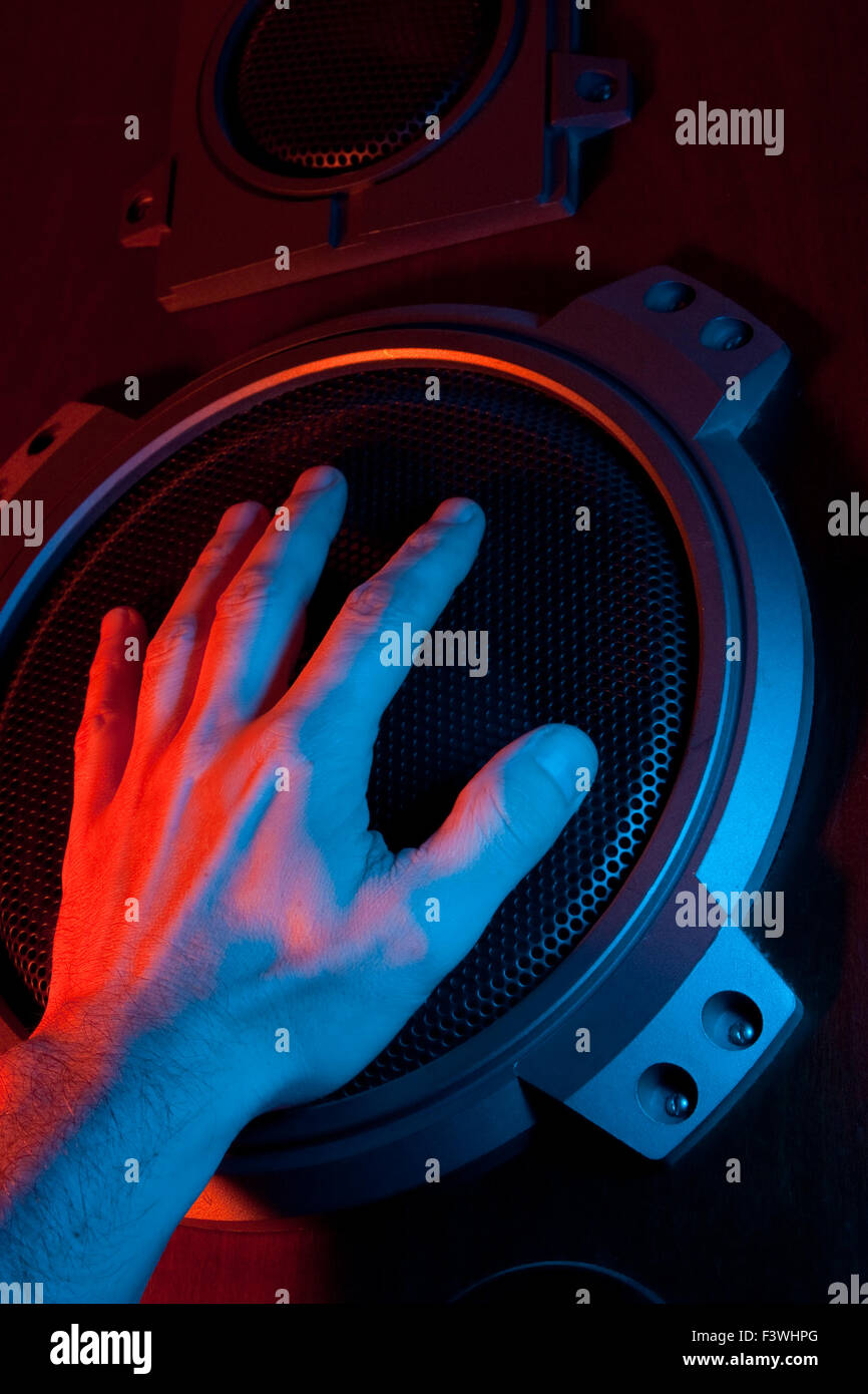 hand covers the speaker Stock Photo - Alamy
