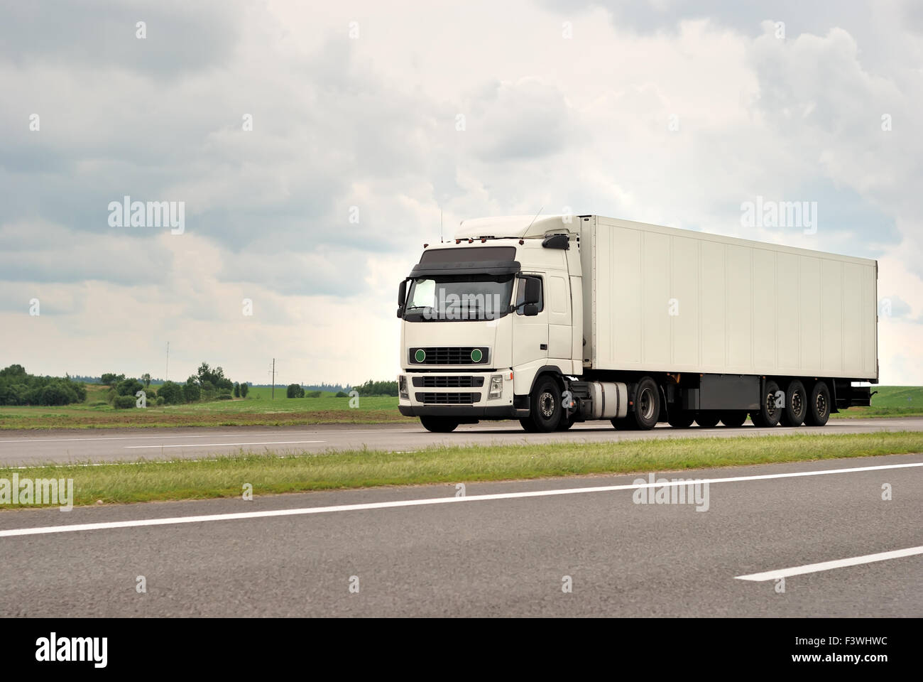 white truck on highway Stock Photo