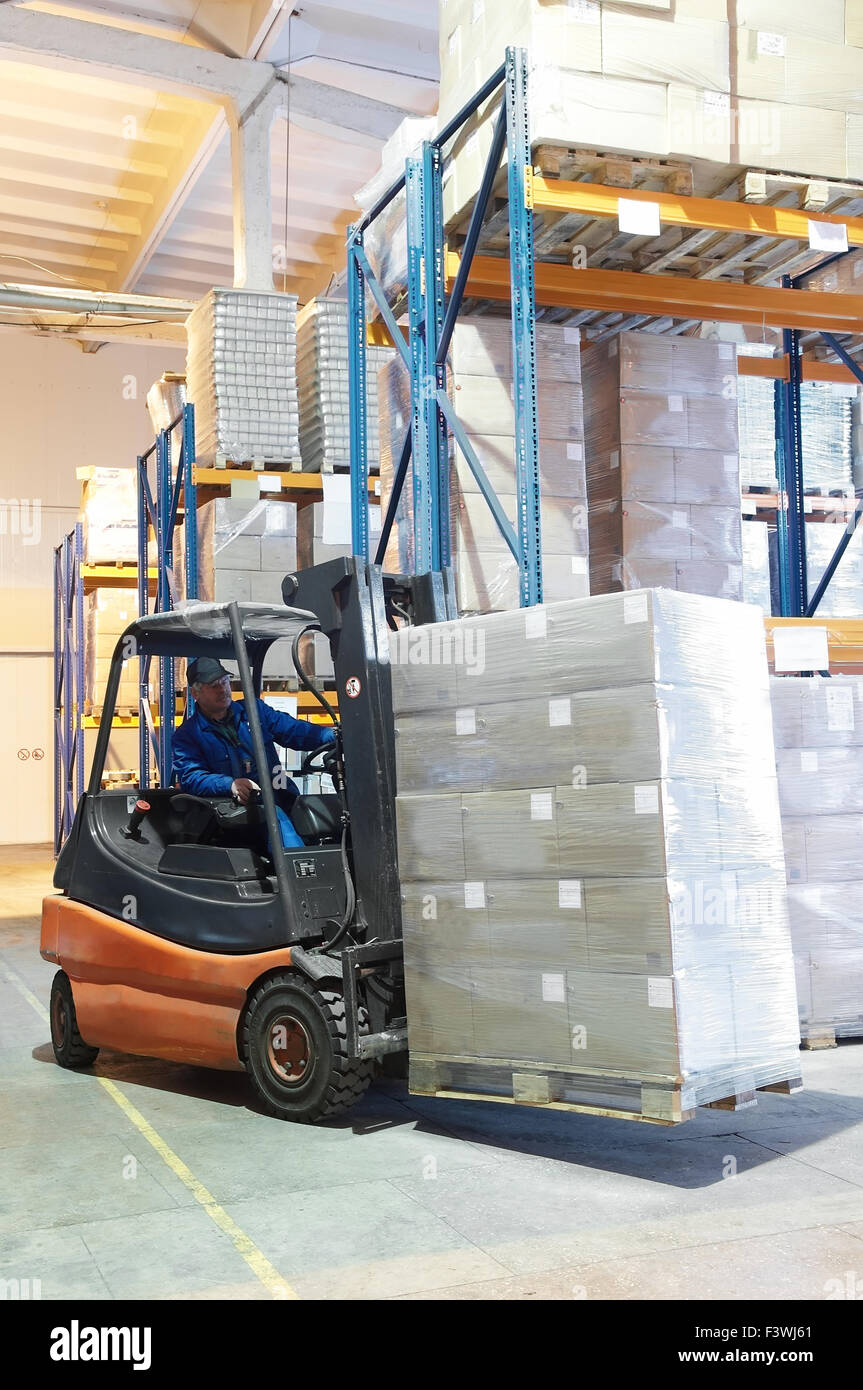 Forklift loader at a warehouse Stock Photo
