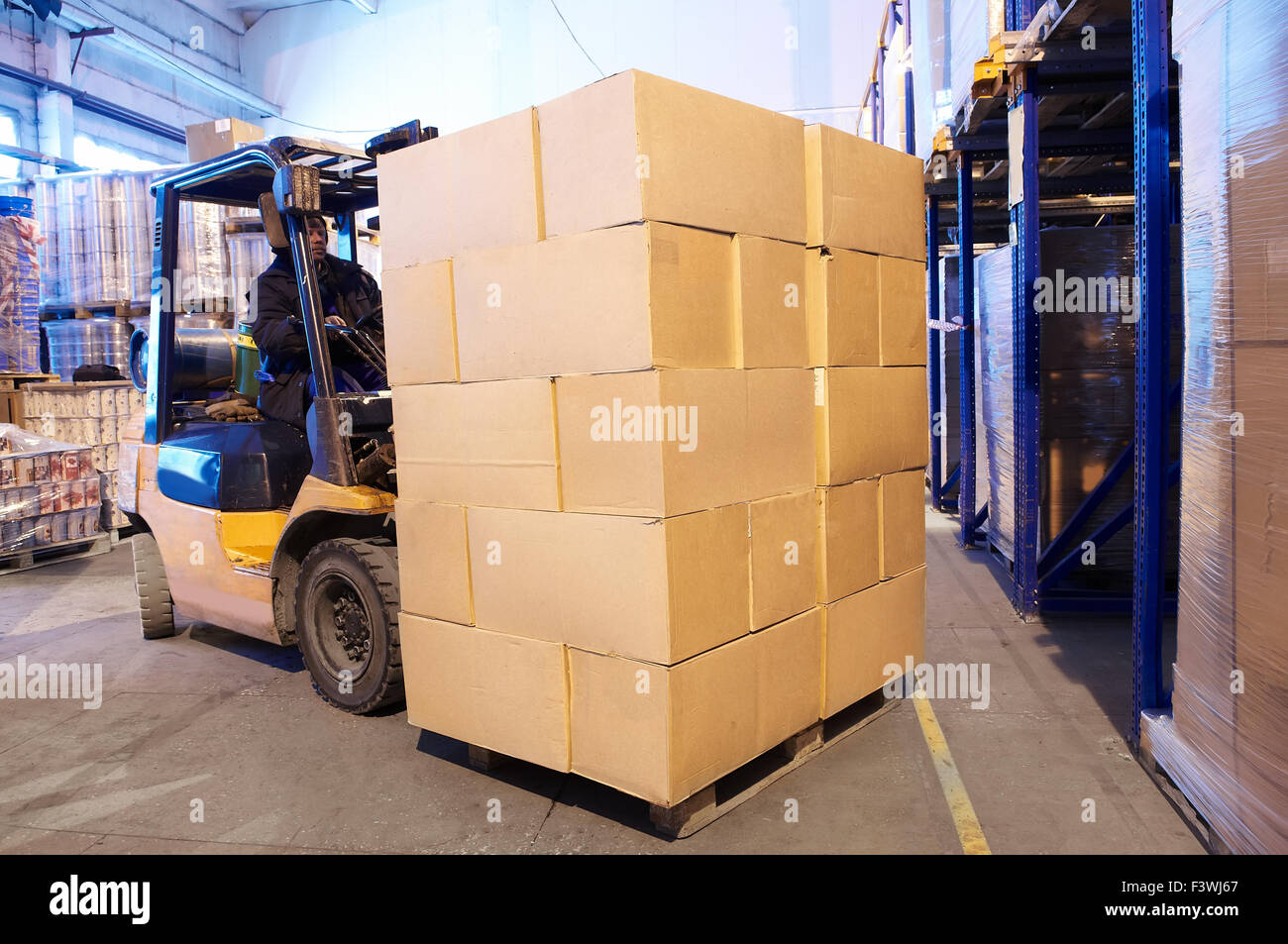 warehouse forklift loader worker Stock Photo