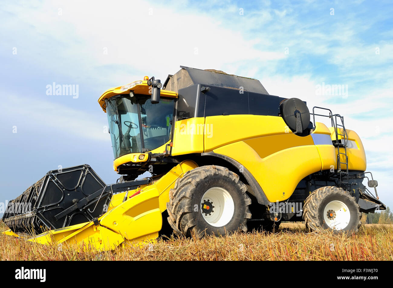 combine harvester during field work on farm Stock Photo Alamy