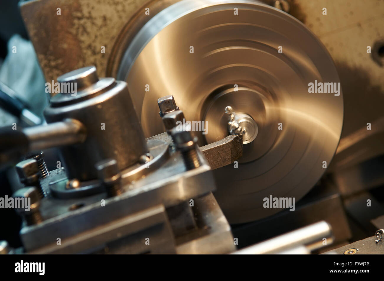 facing metal blank by cutter on lathe Stock Photo Alamy