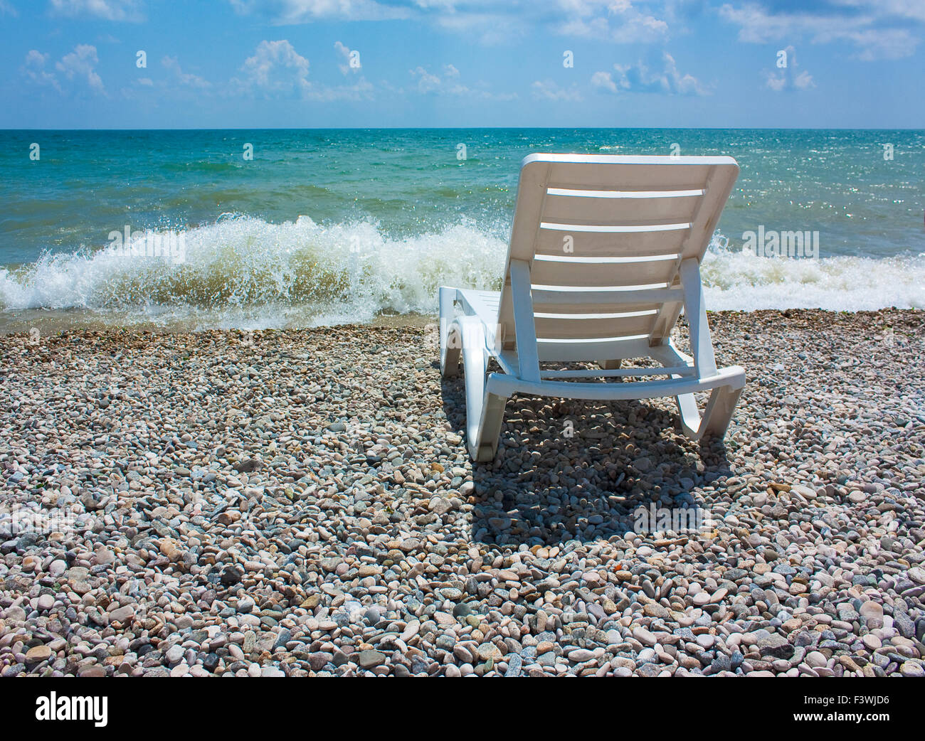 white chaise lounge on the beach Stock Photo - Alamy