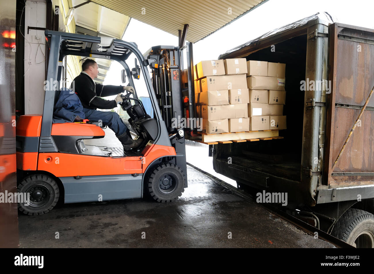 Forklift in warehouse Stock Photo