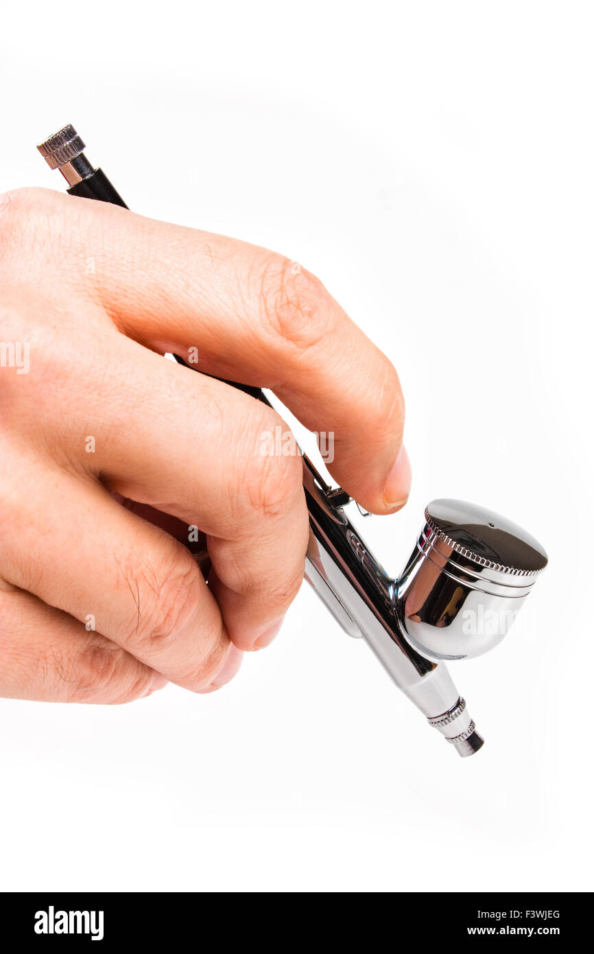 Airbrush in hand Stock Photo Alamy
