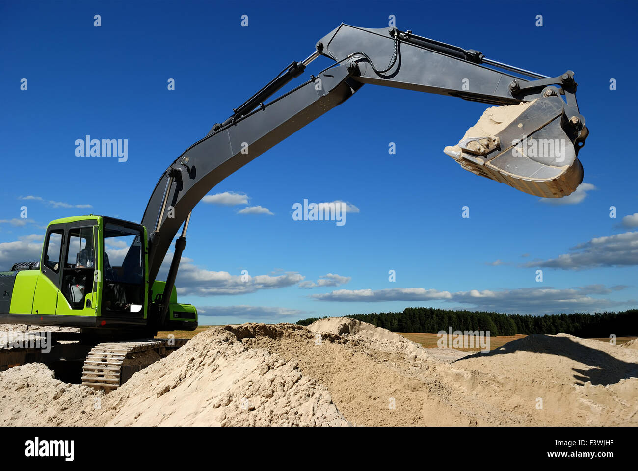 Excavator loader in sandpit Stock Photo