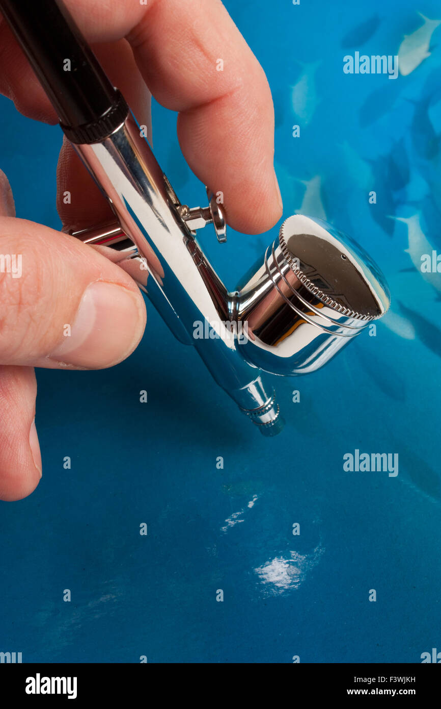 Airbrush in hand Stock Photo Alamy