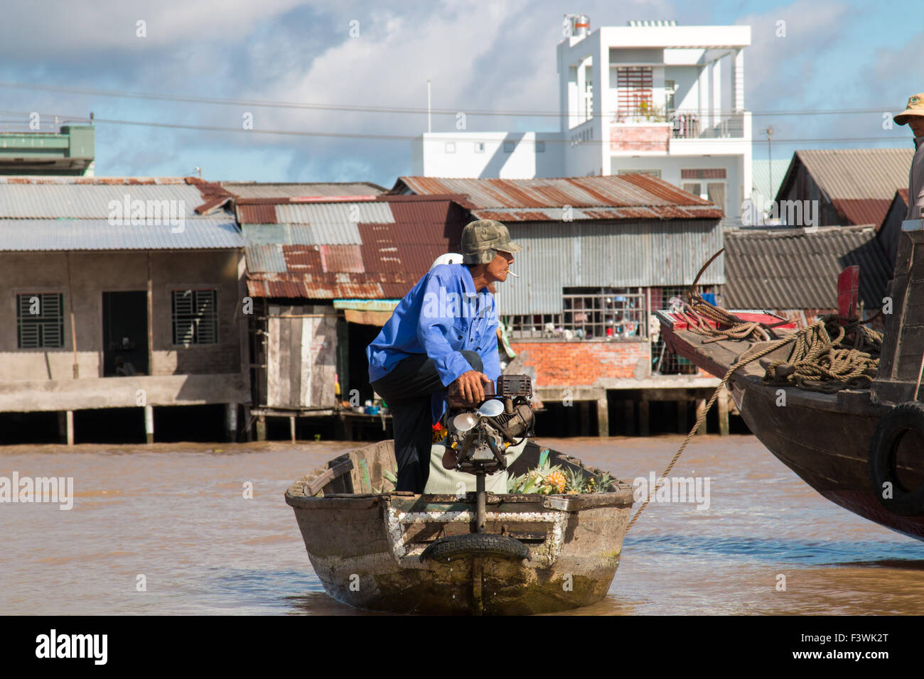 vietnamese man operating his boat on the mekong river,Mekong Delta ...