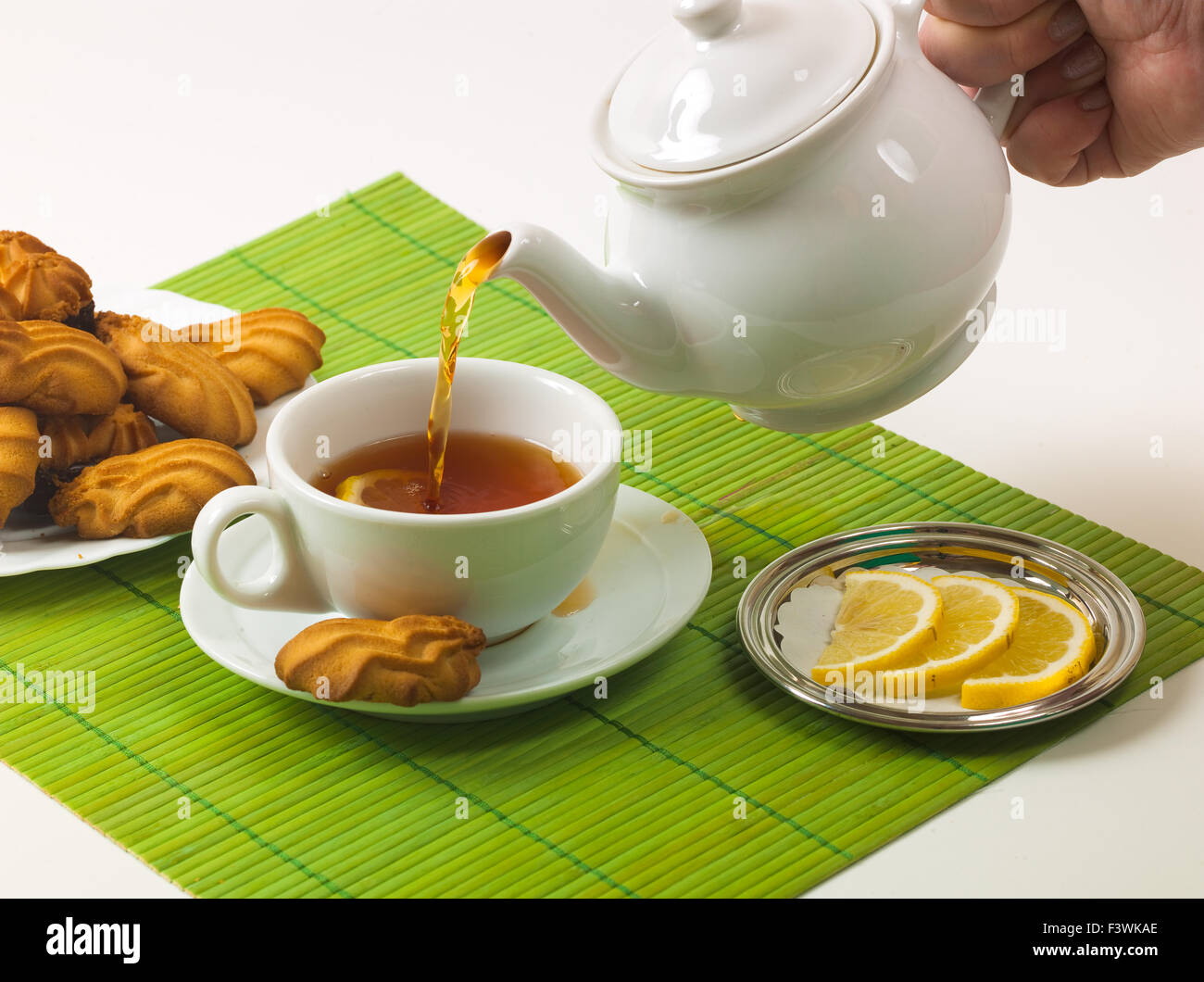 lemon tea and biscuits Stock Photo