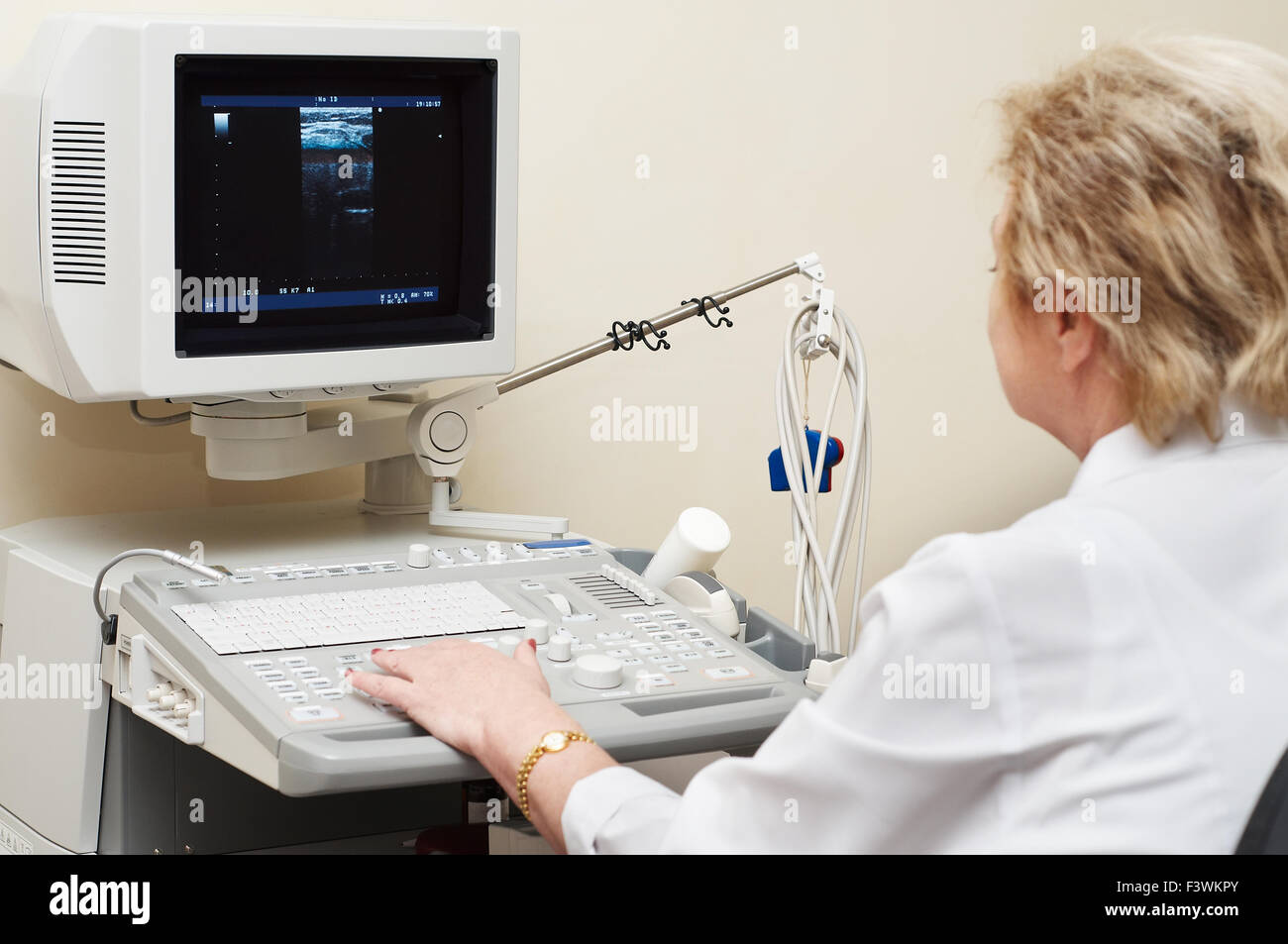 medic using ultrasound system Stock Photo