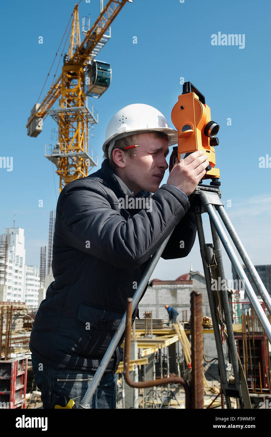 Surveyor with transit level equipment Stock Photo