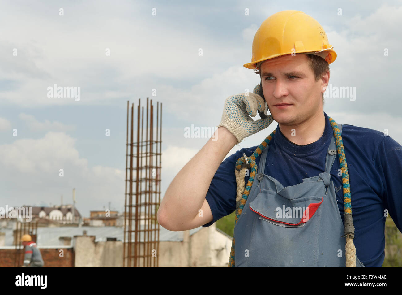 Builder worker with mobile phone Stock Photo