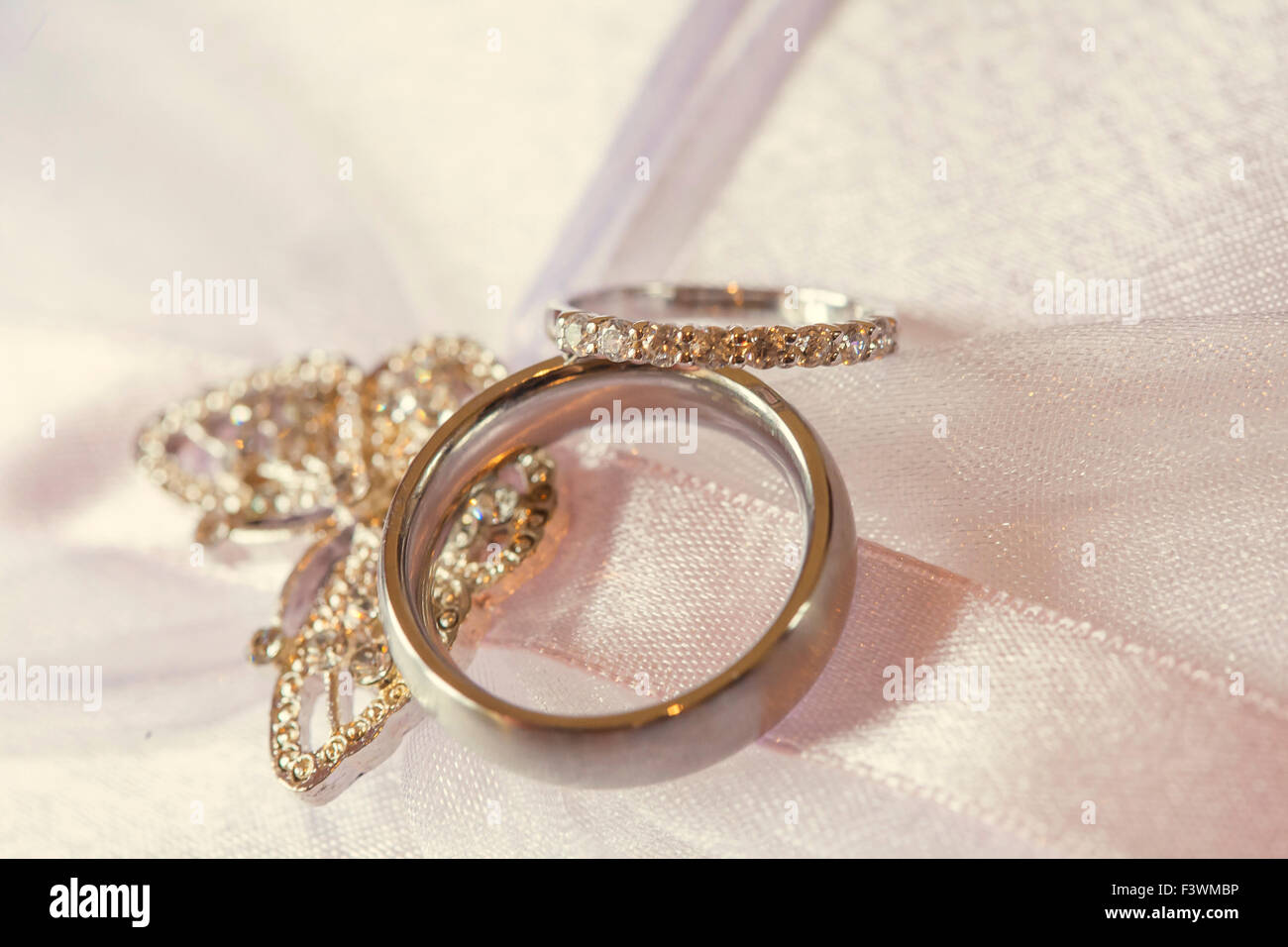wedding rings with diamond butterfly Stock Photo Alamy
