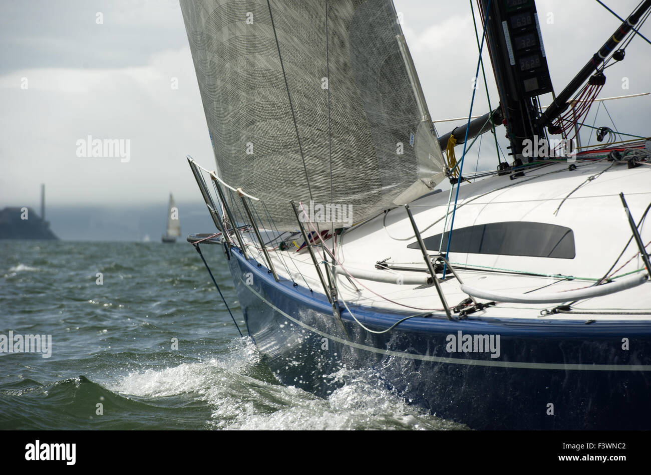 bow with jib sailing through the bay Stock Photo Alamy