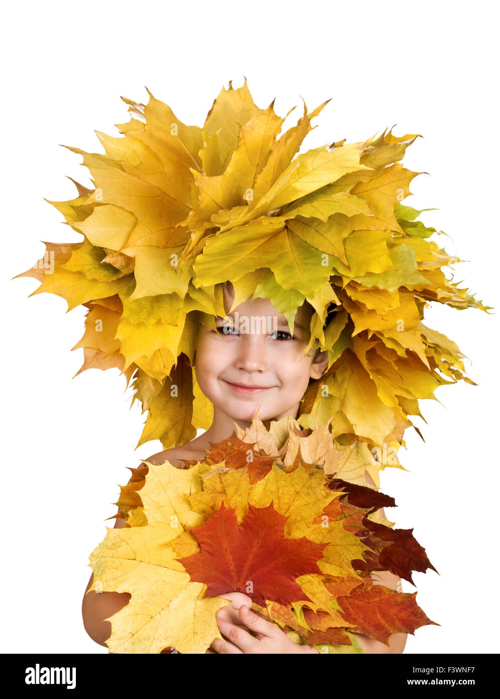 boy with chaplet of yellow maple leaves Stock Photo