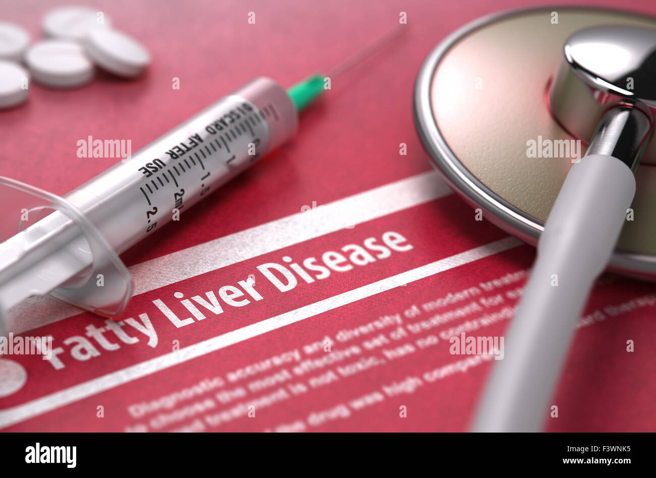 Fatty Liver Disease - Medical Concept on Red Background with Blurred Text and Composition of Pills, Syringe and Stethoscope. Stock Photo