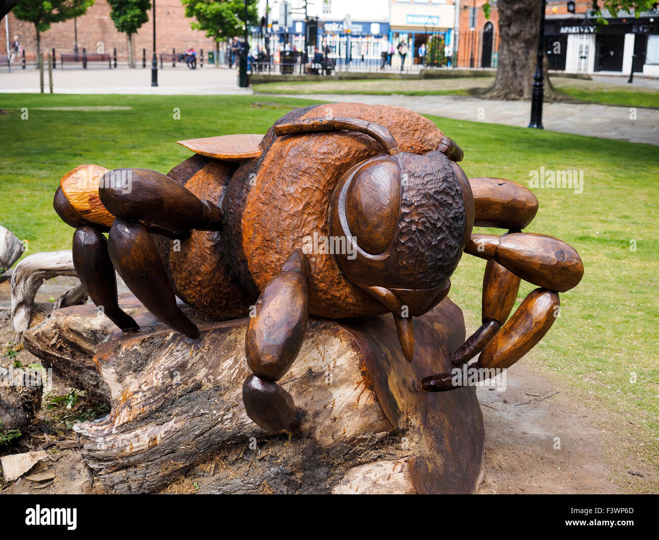 Wood carving of a bee Chesterfield Derbyshire Stock Photo Alamy