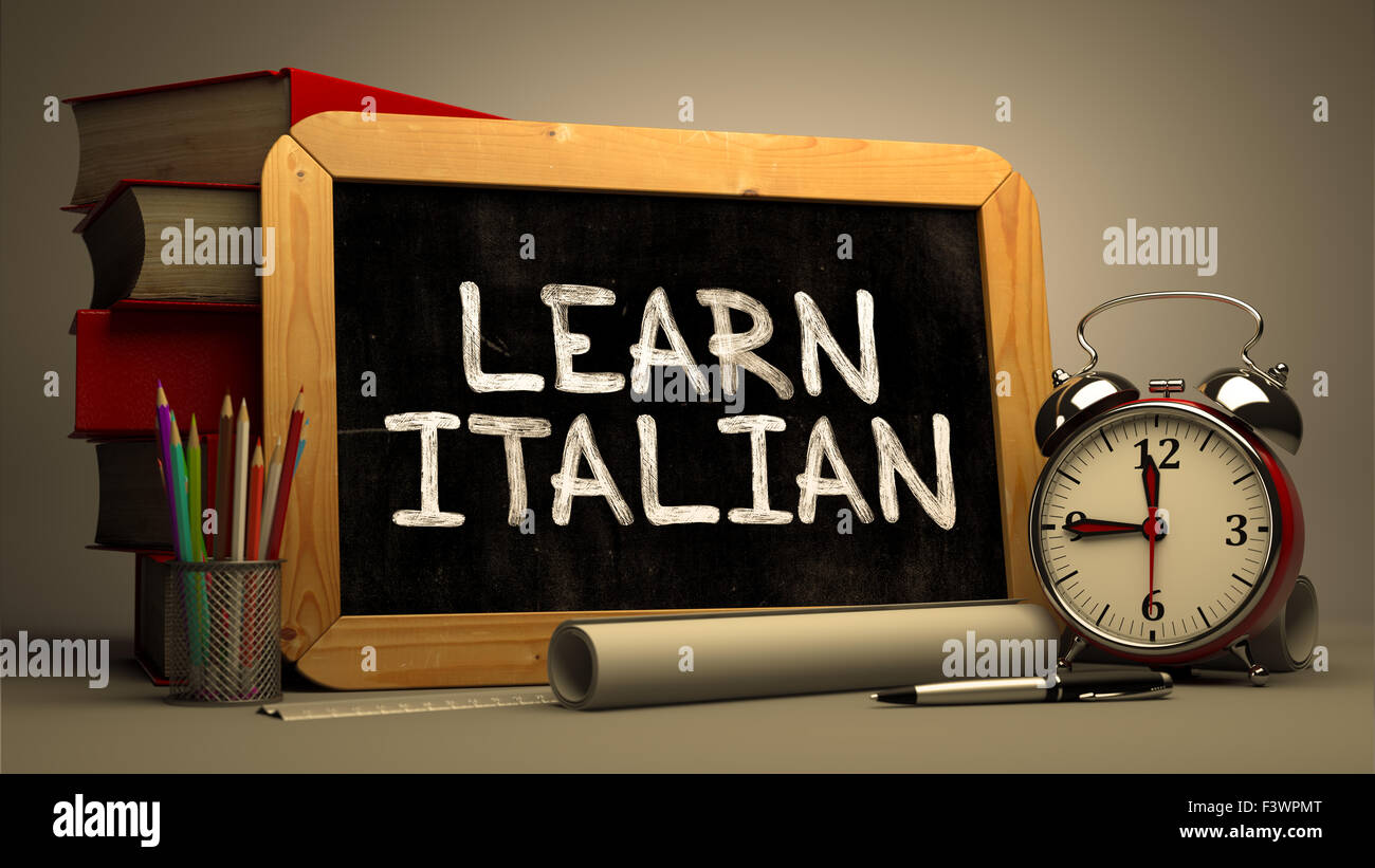 Learn Italian Concept Hand Drawn on Chalkboard. Blurred Background. Toned Image. Stock Photo
