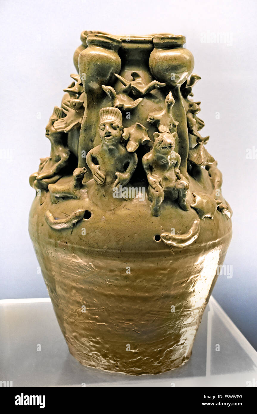Celadon Jar with modeled Human figurines (Wu State of Three Kindoms 222 - 280 AD ) Shanghai Museum of ancient Chinese art China Stock Photo